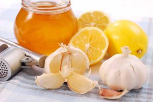 Image of honey, garlic, oranges and lemons