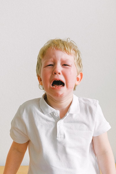 image of young boy crying